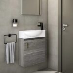 Móvel de fundo reduzido suspenso em madeira clara com lavatório integrado